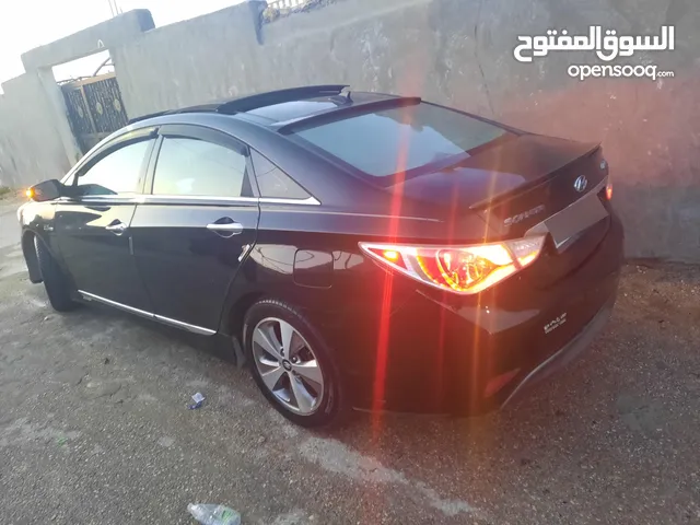 سوناتا هايبرد 2012 للبيع فل بانوراما لون اسود ملوكي 4جيد