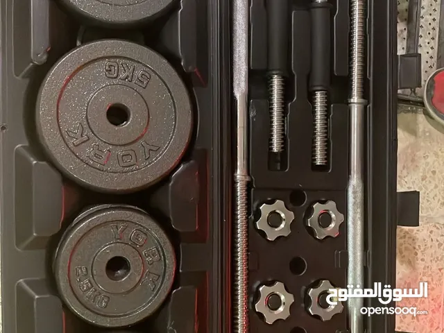شنطة اثقال للبيع تحتوي بار ودامبلز واوزان مجموع 50 كيلو