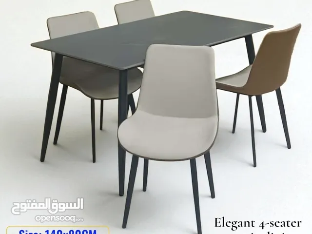 We are selling brand new dining table and chairs