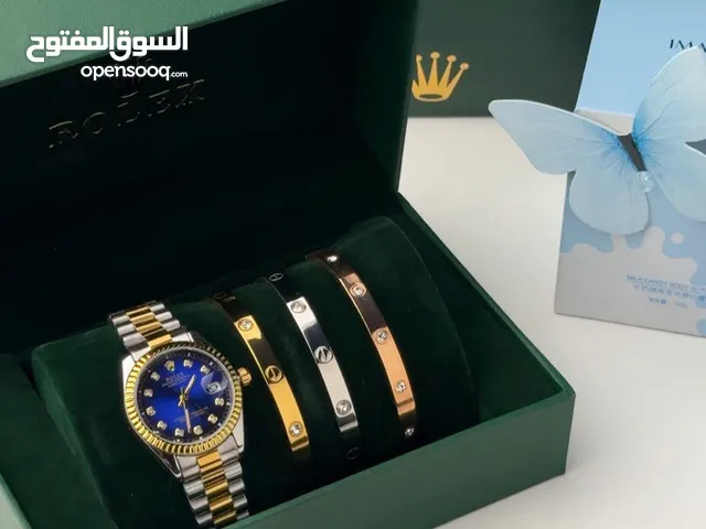 ساعة رولكس وأساور كارتير