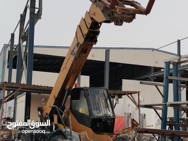 Cat Telehandler TH-417, priced at around 20,000 QR. The telehandler is in working condition,