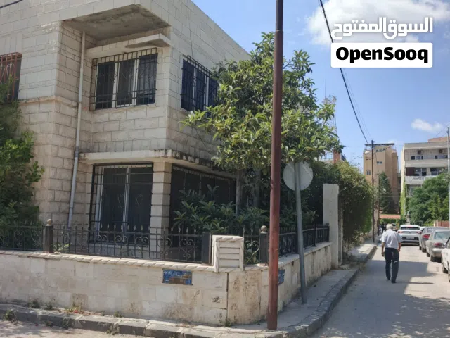 بيت طابقين خلف البريد