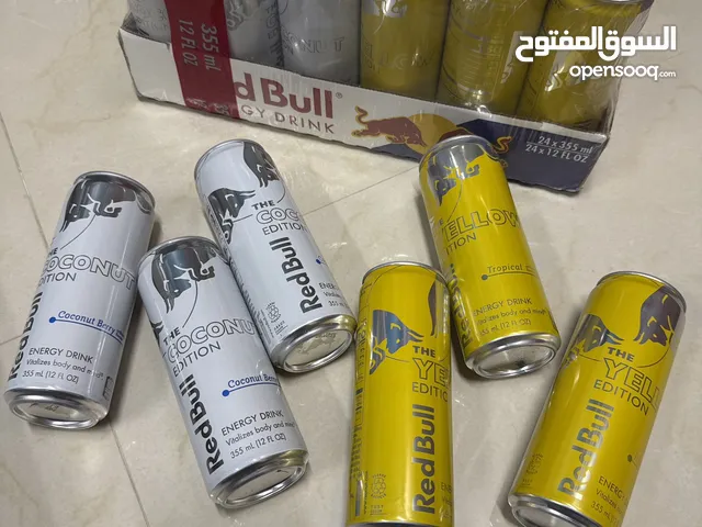 رد بول مستورد من امريكا الحجم الكبير 355ml نكهة التوت و جوز الهند ( الابيض) ، و الاستوائي (الاصفر )