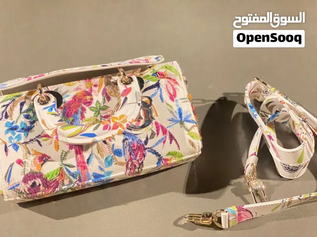 شنطة ديور اصليه برقم السريال