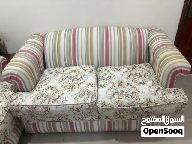 Seven seater sofa set with 6 cushions, one teapoy and four side tables Negotiable