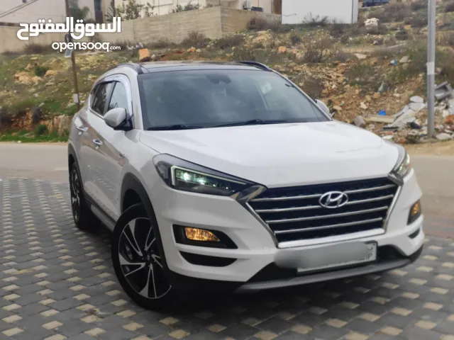 هونداي توسان فل الفل اضافات دهان شركة وعداد أصلي 70000كم فقططط رخصة وتأمين شامل للبيع بسعر مغري