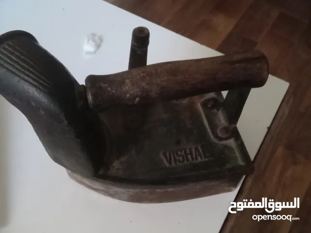 مكوى على الفحم