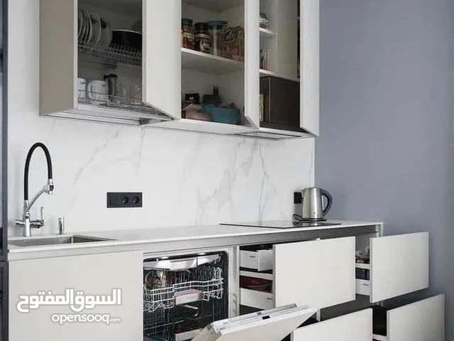 مختص فني تركيب وفك وصيانة جميع انواع المطابخ والديكورات 56764