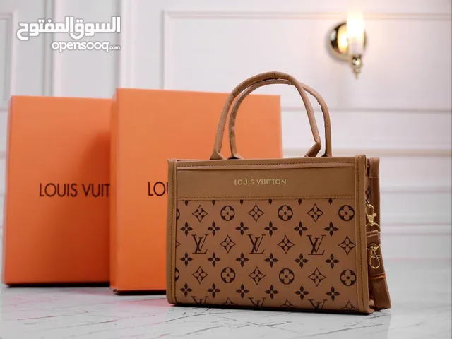 شنتة ستاتي اصلي مع العلبة جلد طبيعي جودة عالية جدا سحاب ويد طويلة مقاس 21×27