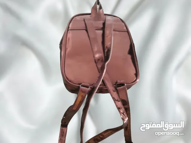 شنطة برونزي صغيرة للخروجات