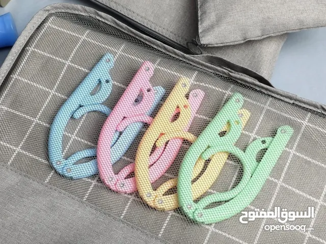 علاق الملابس للسفر