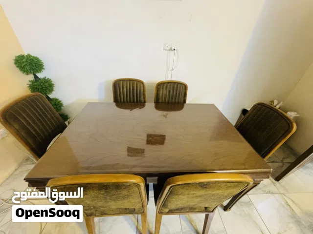 ميز طعام خشب ثقيل ست كراسي