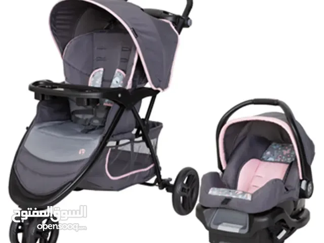 للبيع عربة أطفال مع مقعد سيارة ماركة Baby Trend