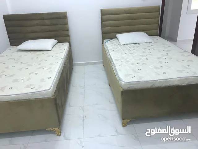 أسرة سنجل مع دولاب