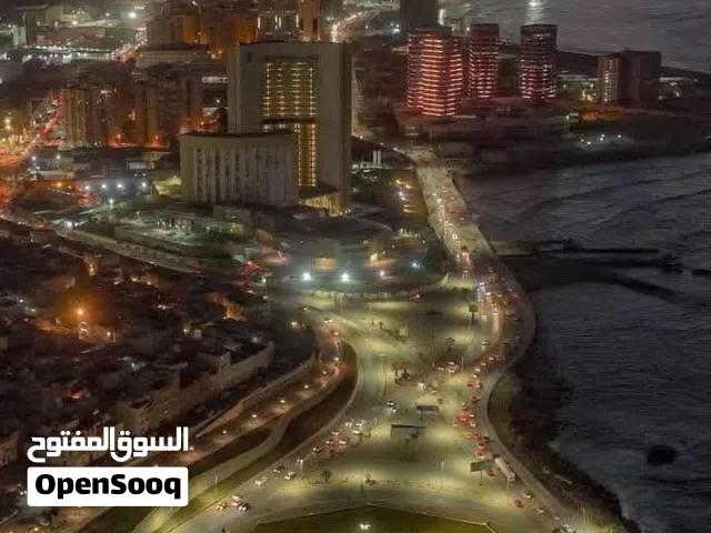 قطعة ارض 420م واجهتان خلف حلويات الساحل 11يوتيوقريبه من طريق معبد موقع ممتاز جدا