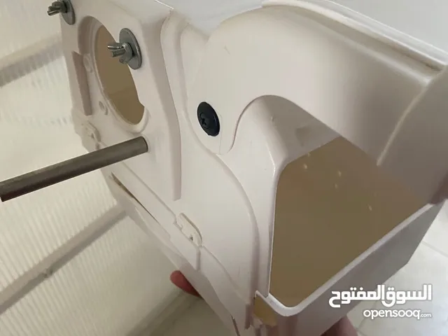 قفص طيور مع خانة