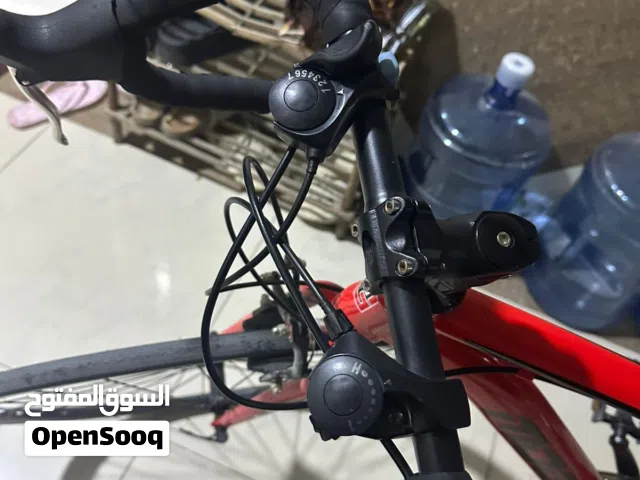 road bike new used for 31 days with light tor wheels color red  location:ajman bustan