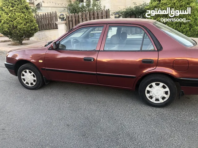 تويوتا كوروللا اوتوماتيك اصلي موديل 2000