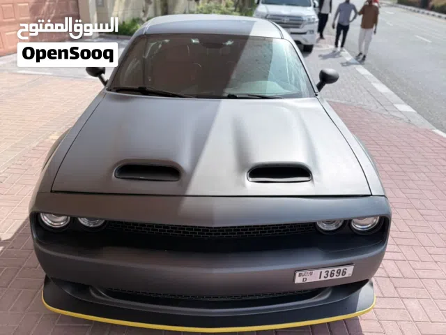 A stunning 2019 Dodge Challenger SXT that combines the legendary Widebody presence with the fuel eff