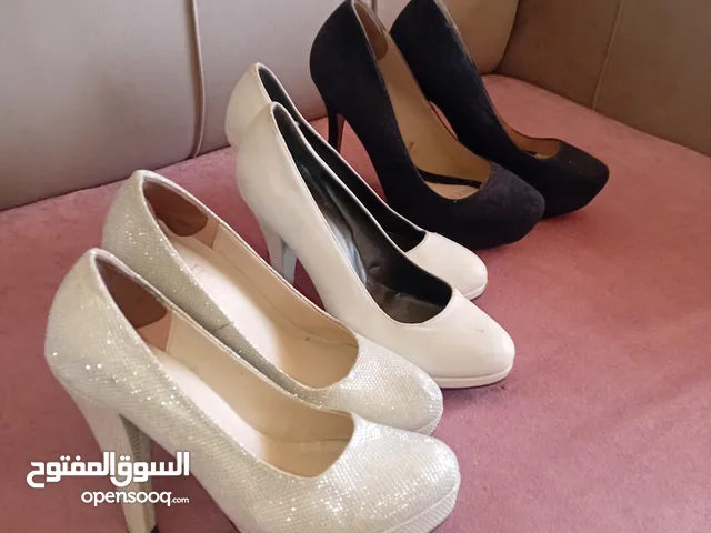 Black With Heels in Amman