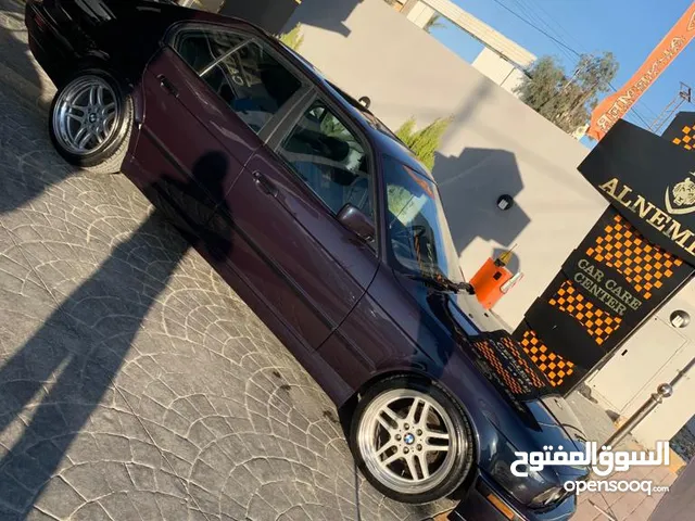 BMW e34 520IA ماتور 28 اسود
