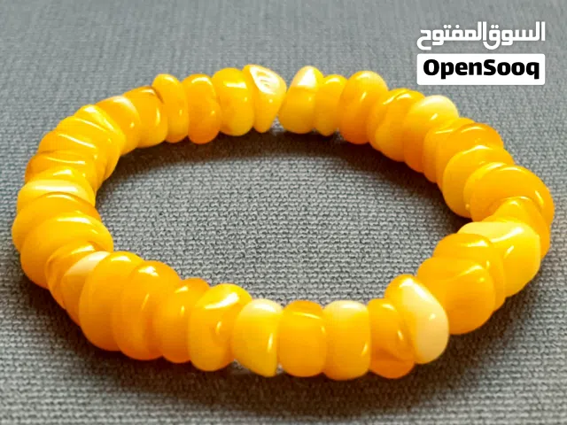 اسوارة قياس مرن احجار كريمة كهرمان بلطيقي اصفر ذهبي مصقول golden amber