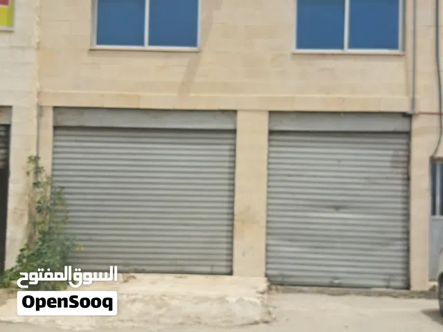 محلات صناعات خفيفه للايجار كهرباء 3 فاز  سدد باطون مرخصه ابو علندا اسكان الكهرباء  مطل على طريق الحز
