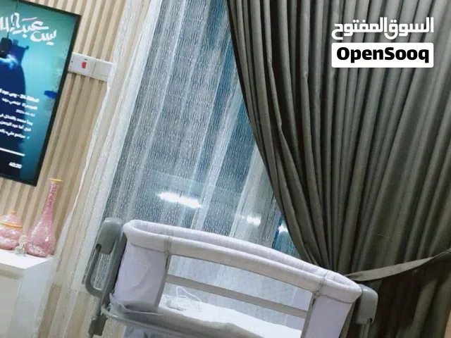 سرير طفل كهربائي هزاز