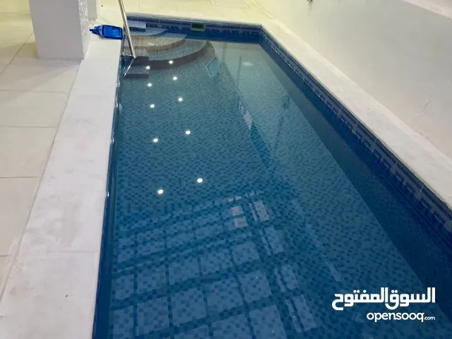 اعمال برك السباحه والنوافير والشلالات