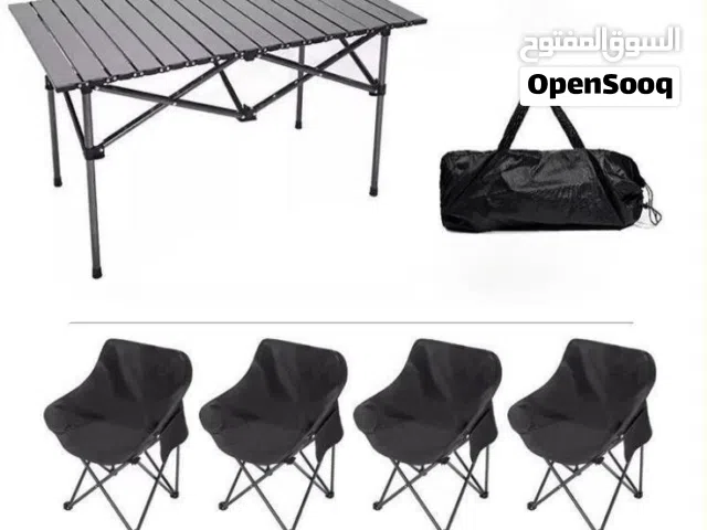 ميز تخييم مع اربع كراسي مع كامل الملحقات والجنط الخاصة