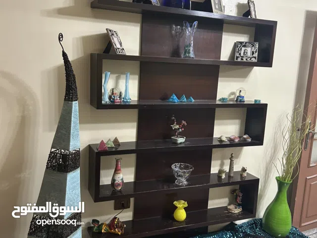 Shelves مكتبة رفوف