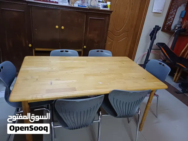Wooden table with 6 chairs