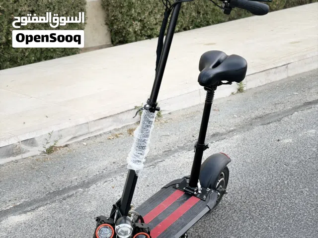 سكوتر كهربائي وحش مع كرسي نظيف ولقطة