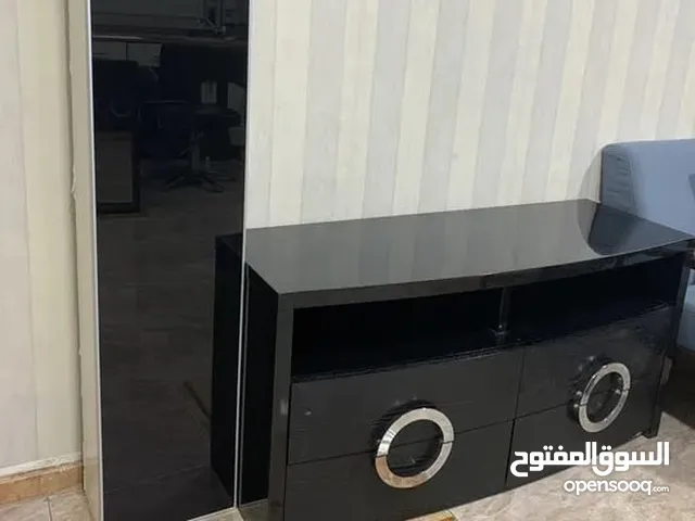 خزانة تلفزيون كجديدة