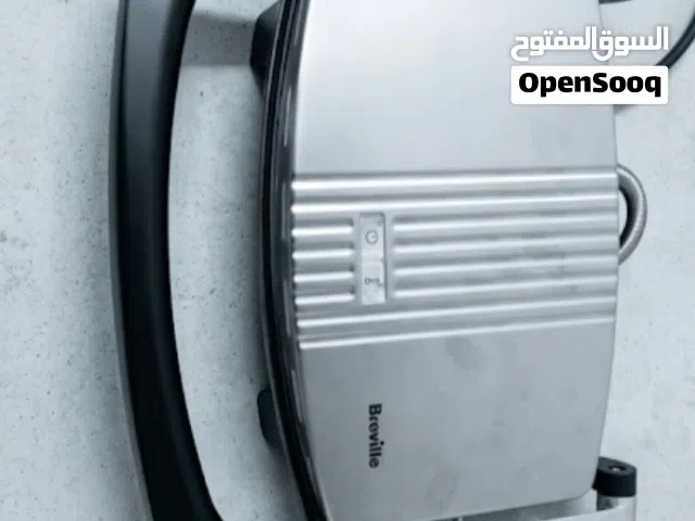 **شواية كهربائية وكباسة ساندويشات