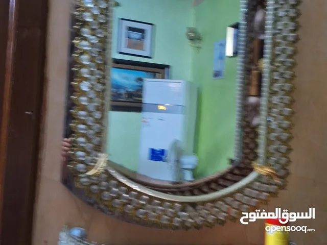 مرايا مع قاعدهلون ذهبيه