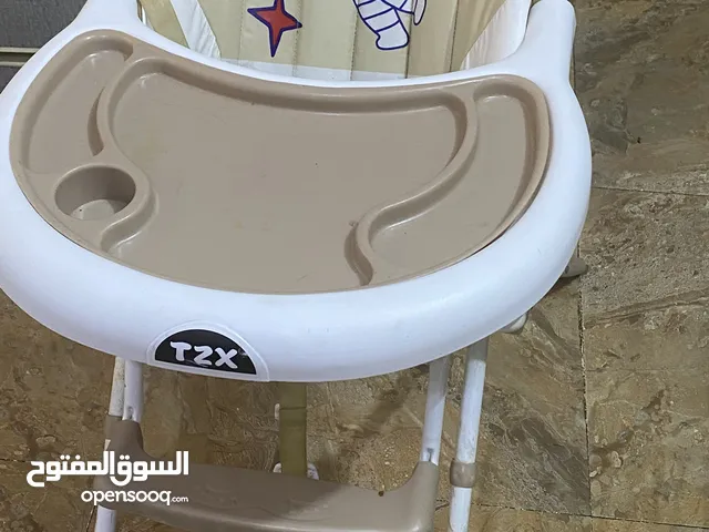 كرسي طعام للأطفال