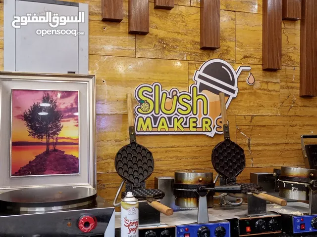 خطاط ابو قاسم لصناعة اللوحات الإعلانية