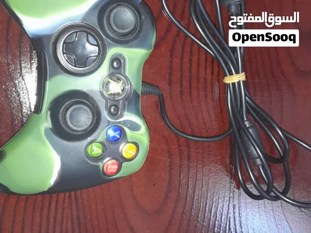 Mannete xbox 360 avec fill et protecteur état 9/10 Fonctionne parfaitementà