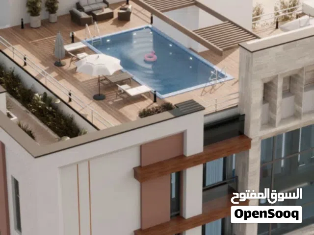 اقوى فرصة استثمارية مقابل جامع محمد الامين من غرفتين وصالة مع تشطيبات فندقية ب33,600 واقساط30شهر