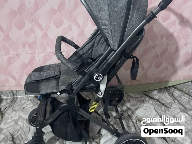 عربة أطفال جديده