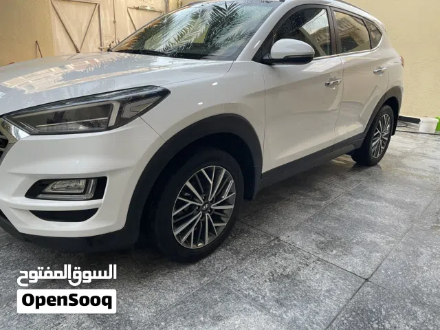 توكسان خليجي   رقم بصره  مكفوله من البارد والتبديل والصبغ بعده ع وضع الشركه