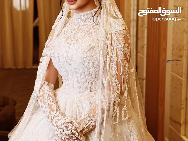 دار أزياء عبد بالوش  لفساتين الزفاف والهسرة فساتين اعراس صناعة يدوية بالكامل  شحن لكافة انحاء العالم
