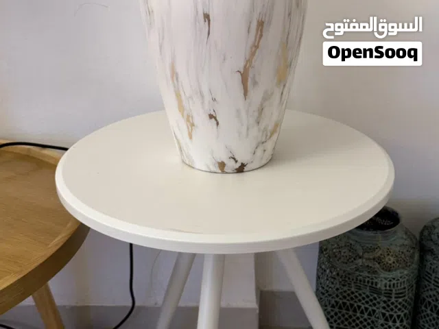 vase with table with flowers