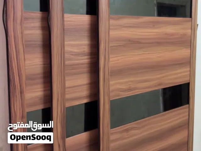 The closet doors are brand .