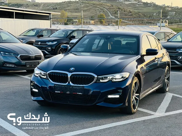 BMW 330E // M- PACKAGE  // 2020-2019 .
