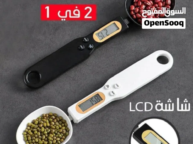 ميزان وملعقة