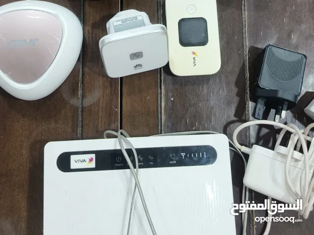 4 routers, one portable, two headphones and chargers