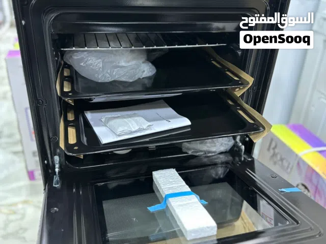 كوزنير من مارك Gork اسود كامل 50cm/50cm تصميم انيق و جودة عالية   غاز بأربع شعلات  2 لاطات