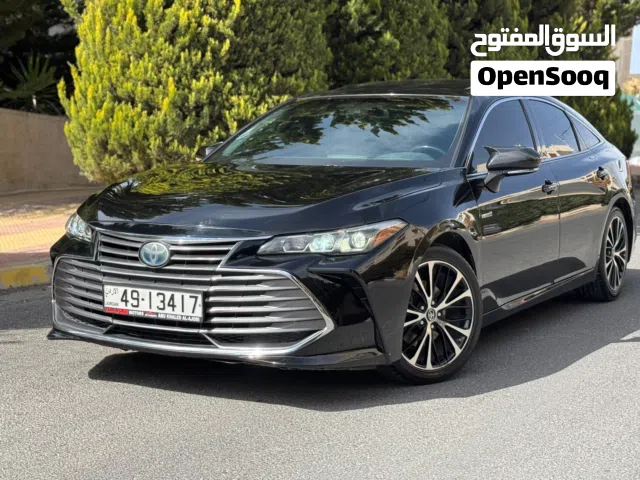 تويوتا افالون 2019 xle لون اسود ملوكي 7 جيد